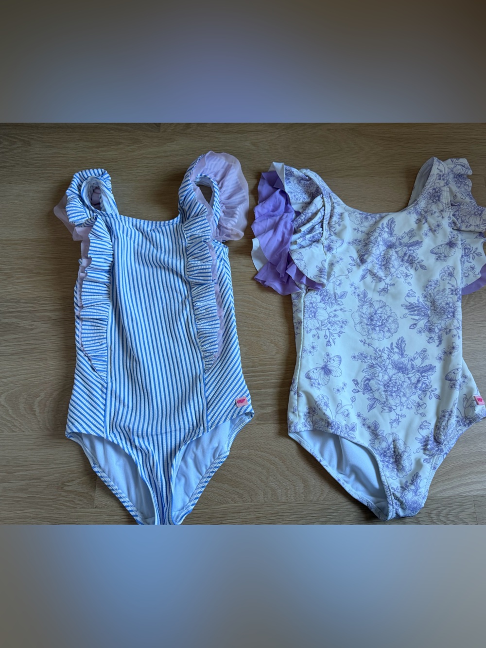 Pack of two Rufflebutts one-piece swimsuits - Girls size 10